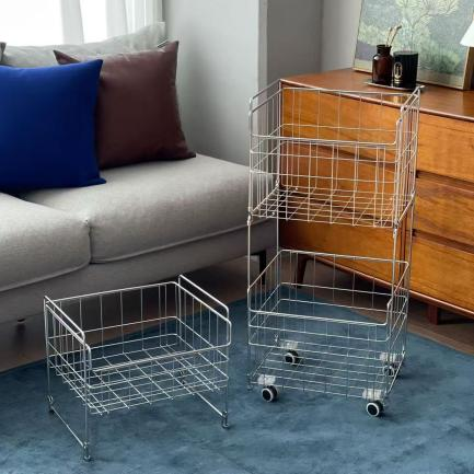 Isang naka-istilo at praktikal na three-tiered pull-out laundry basket
